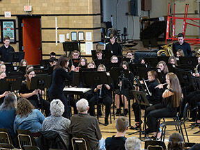 On Sunday, February 19, 2023, Washington Community High School hosted the WCHS Bands Winter Concert in the West Gym. There are four concert bands at WCHS. Jim Tallman directed the Symphonic Band and the Symphonic Winds. Lisa Parrott, shown here directin...